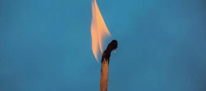 Image of a match burning