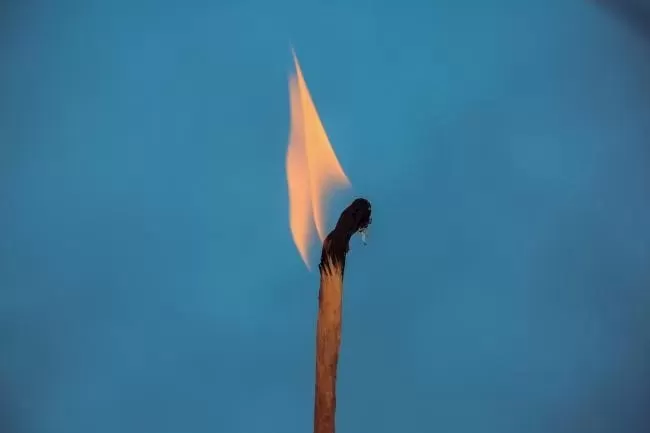 Image of a match burning