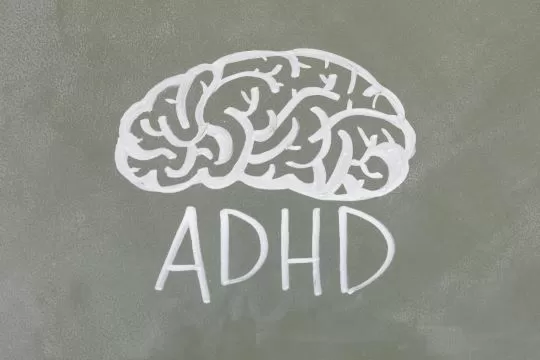 Image of a brain with letters ADHD; photo credit to Pexels Tara Winstead